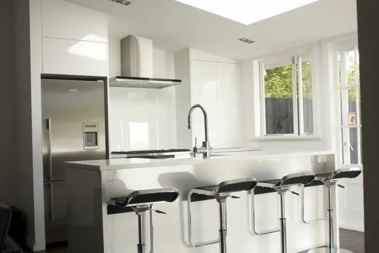 Gloss Lacquer And Caesarstone Tops