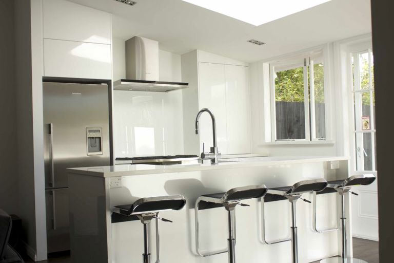 Gloss Lacquer And Caesarstone Tops