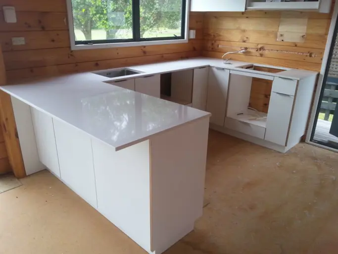 Plywood With Exposed Edges And Engineered Stone Tops