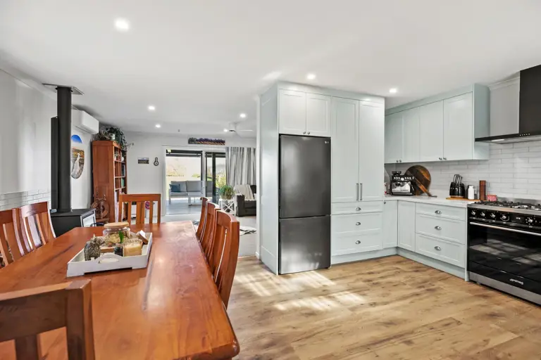 Painted Kitchen With Stone Tops