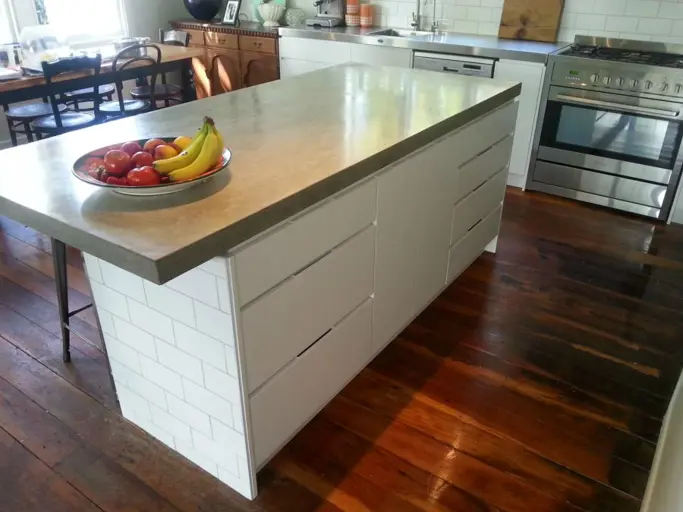 Melteca Kitchen With Concrete And Stainless Steel Tops
