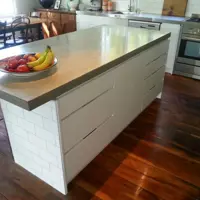 Melteca Kitchen With Concrete And Stainless Steel Tops