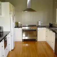 Painted Kitchen With Gloss Laminate Tops